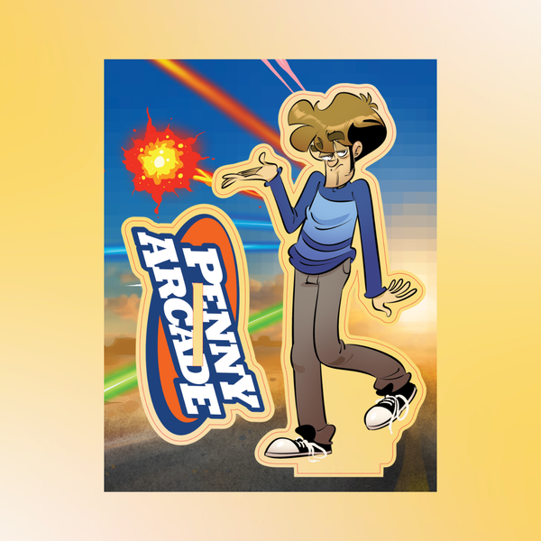 A cartoon-style acrylic panel featuring the character Tycho Brahe of Penny Arcade, with brown hair, a blue shirt, and gray pants, posed next to a large 'PENNY ARCADE' logo on a blue and orange background. 