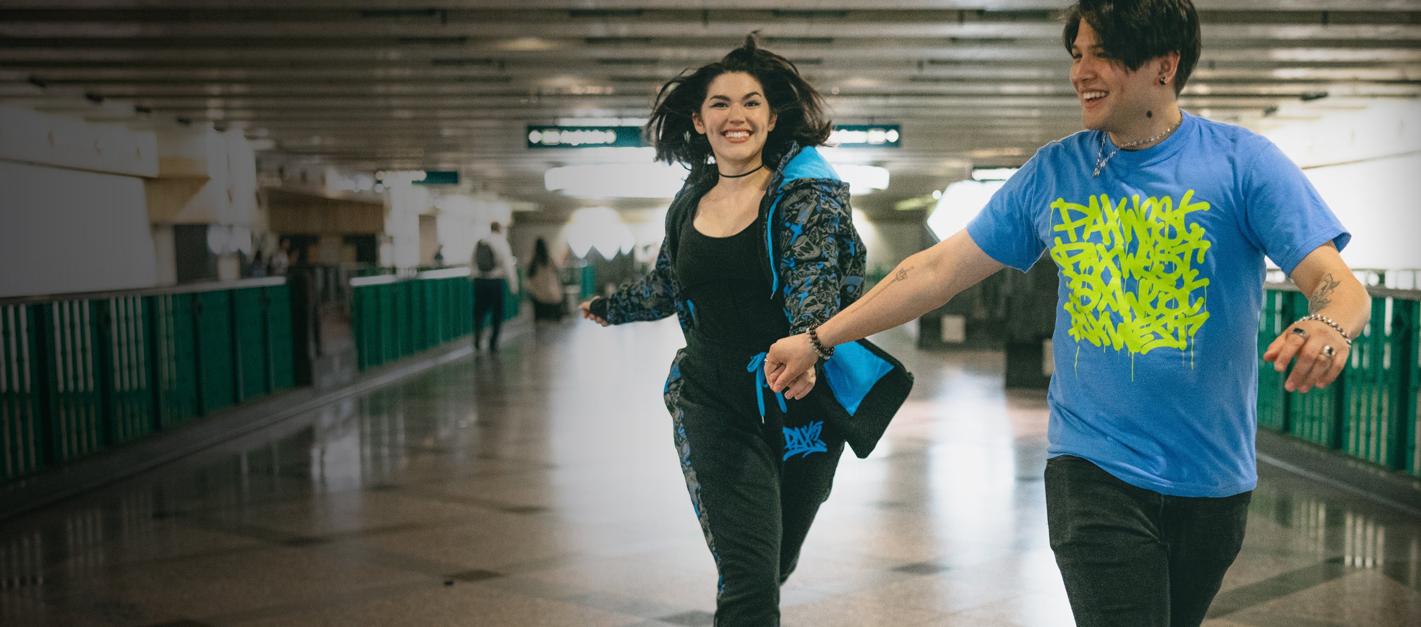 PAX West 2025 Collection. Image includes West Drip Tee & Graffiti Zip-Up Hoodie