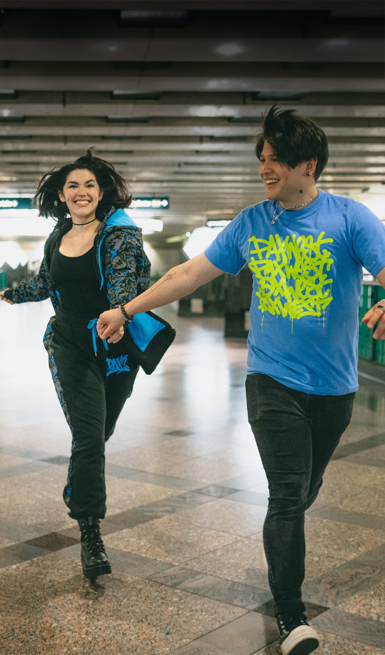 PAX West 2025 Collection. Image includes West Drip Tee & Graffiti Zip-Up Hoodie